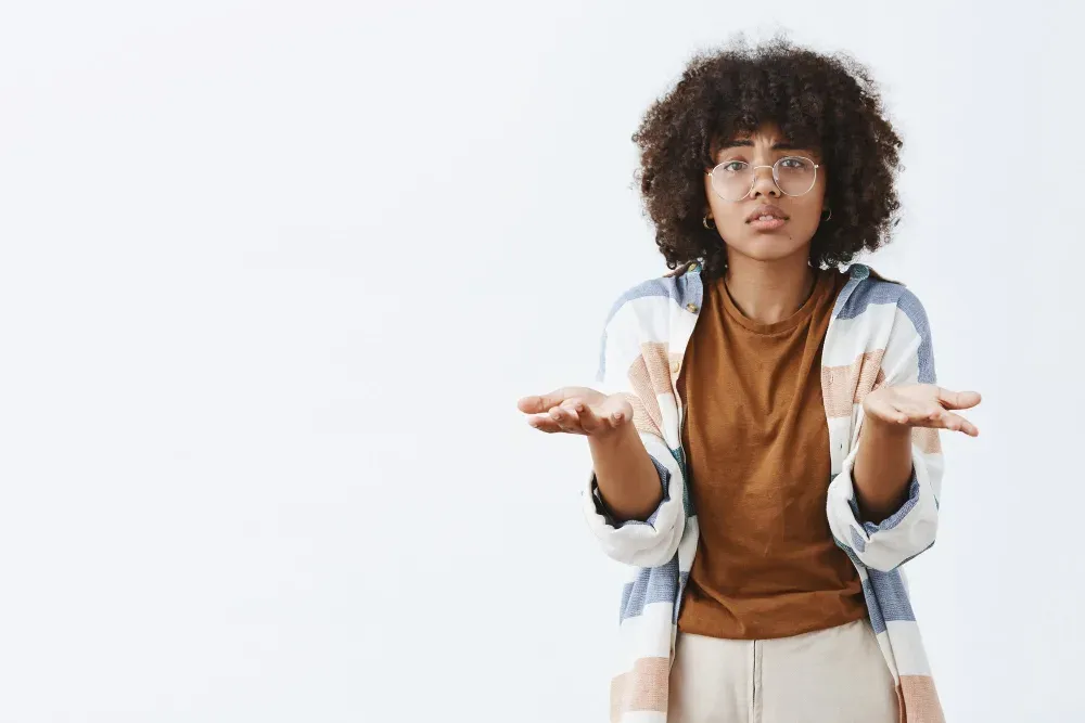 A frustrated finance officer shrugging, unsure what to do about outdated accounting software